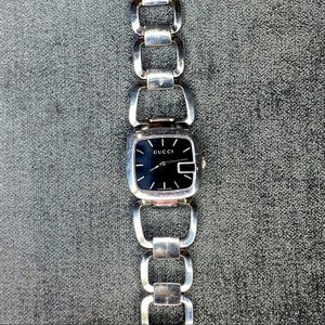 Ladies Gucci G-class stainless steel bracelet watch.